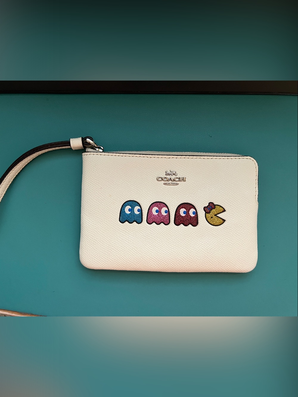 Coach White Leather Wristlet with Colorful Arcade Character Appliqués